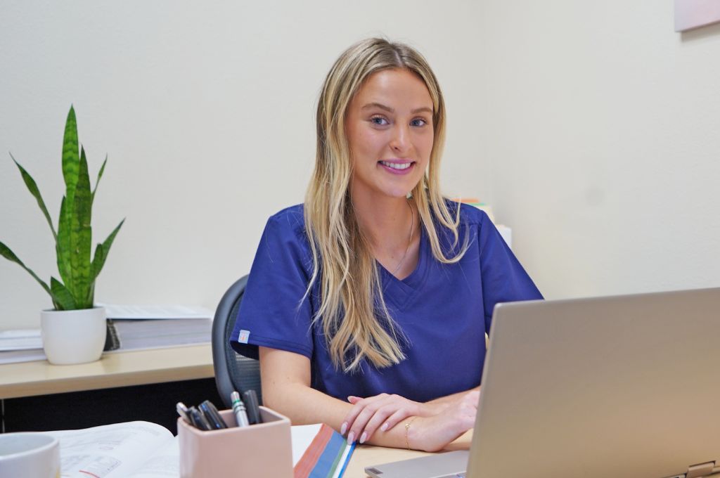 A medical billing and coding specialist in Texas works from her computer.