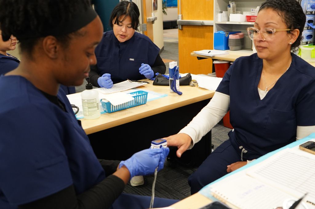CALRegional students practicing clinical skills during medical assistant training near Pasadena, CA