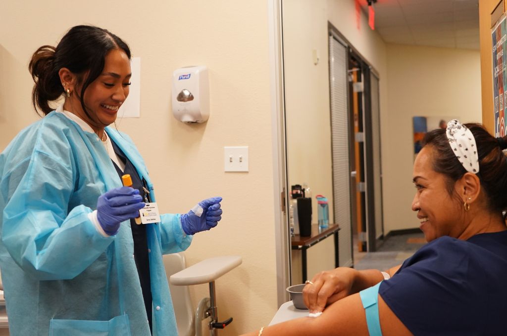 CALRegional-administered phlebotomy students receiving hands-on lab instruction at Norwalk-La Mirada Adult School near Anaheim, CA.